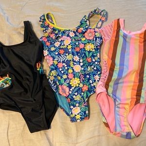 Three 6/6x girls swimsuits (2 Art Class, 1 Cat and Jack)